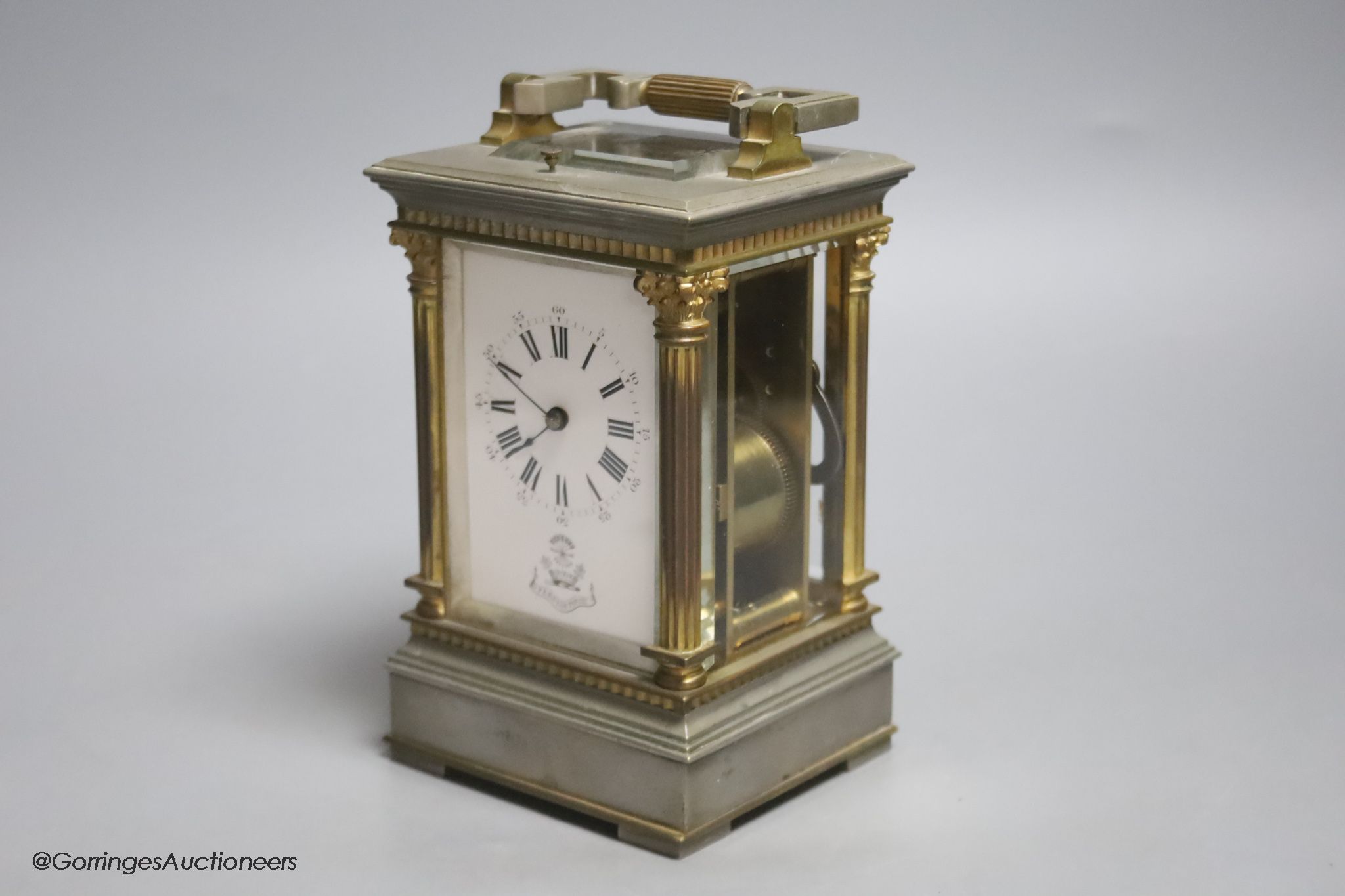 A silvered and gilt brass Corinthian pattern carriage clock, height 17cm